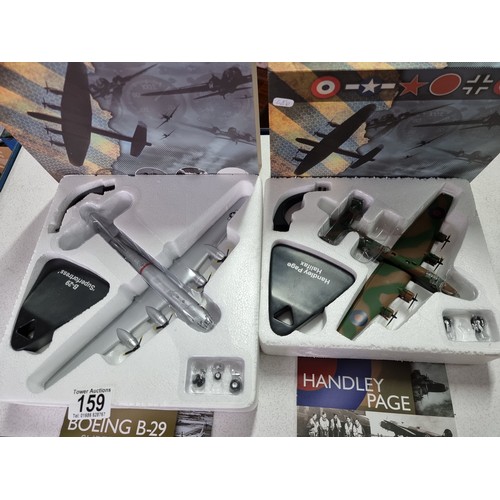 159 - 2 x boxed as new atlas editions diecast aeroplane models to be displayed on stands. Including a B/29... 