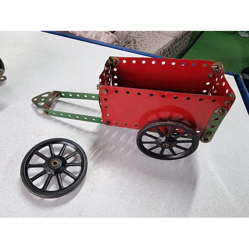 161 - An early vintage Meccano red tractor and trailer fully assembled all with original parts in good vin... 