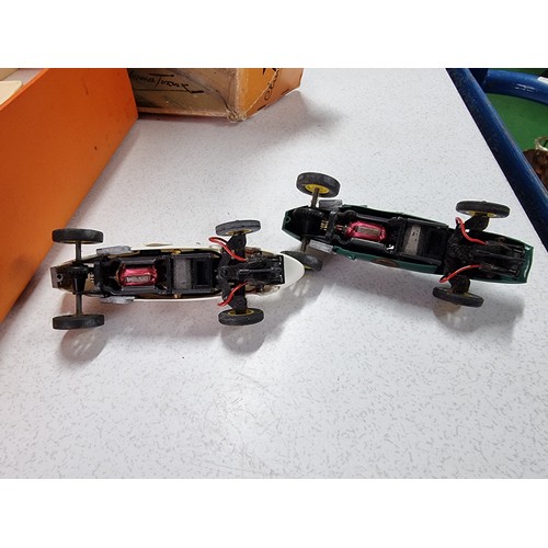 163 - A vintage club VIP raceway slot racing set, incomplete but to include 2 good collectable cars and a ... 