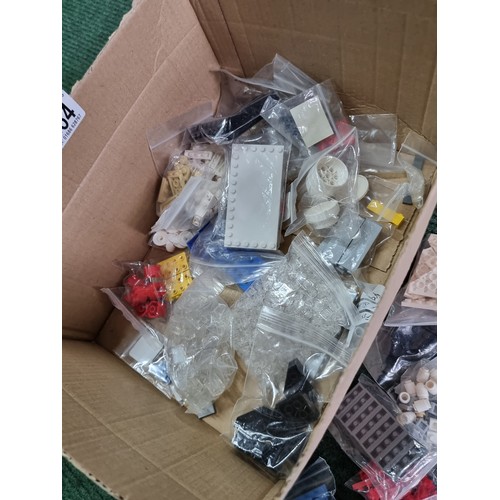 165 - A large collection of specialist Lego pieces 2.7kg in total. Including many new and sealed spare Leg... 