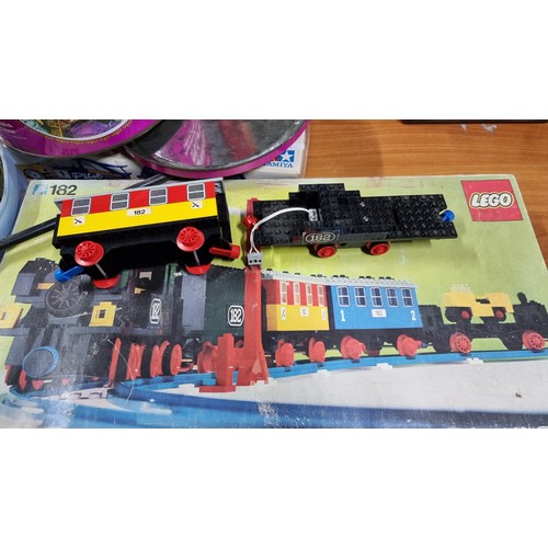 185 - Vintage boxed Lego 182 train set with all the carriages and locomotive, loco needs reassembling appe... 