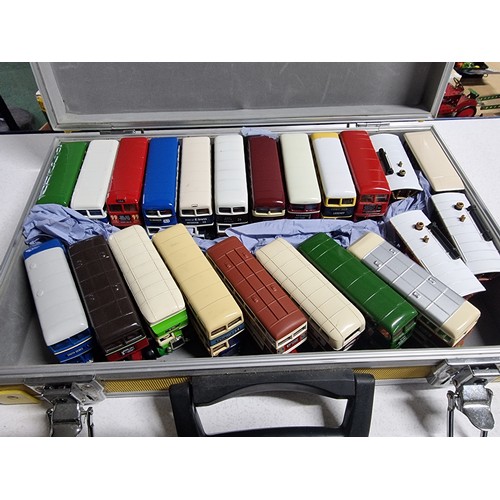 174 - A metal lockable case containing 19 diecast buses and 3 x steam engines all in excellent condition a... 