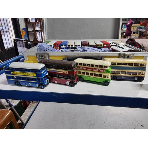 174 - A metal lockable case containing 19 diecast buses and 3 x steam engines all in excellent condition a... 