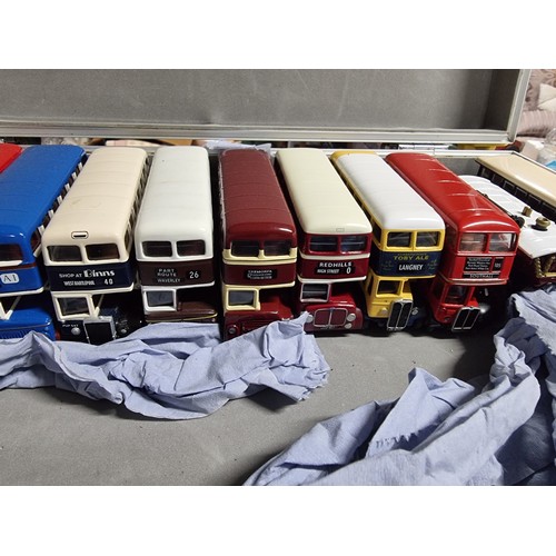 174 - A metal lockable case containing 19 diecast buses and 3 x steam engines all in excellent condition a... 