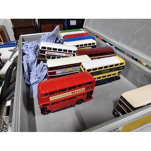 174 - A metal lockable case containing 19 diecast buses and 3 x steam engines all in excellent condition a... 