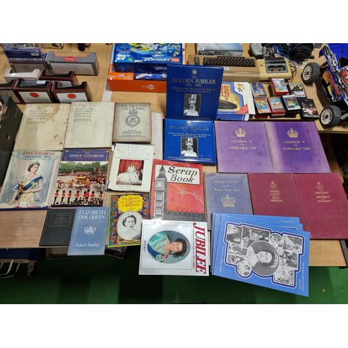 238 - A large collection of Royal memorabilia books including coronation books for King George V, Edward V... 