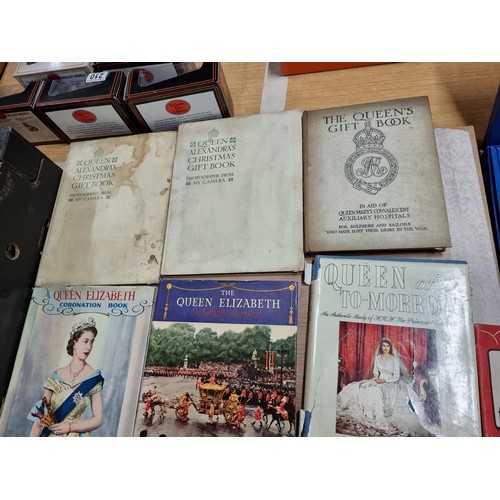 238 - A large collection of Royal memorabilia books including coronation books for King George V, Edward V... 