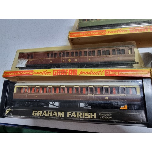 179 - A quantity of vintage new old stock Graham Farish coaches 2 with matching numbers.