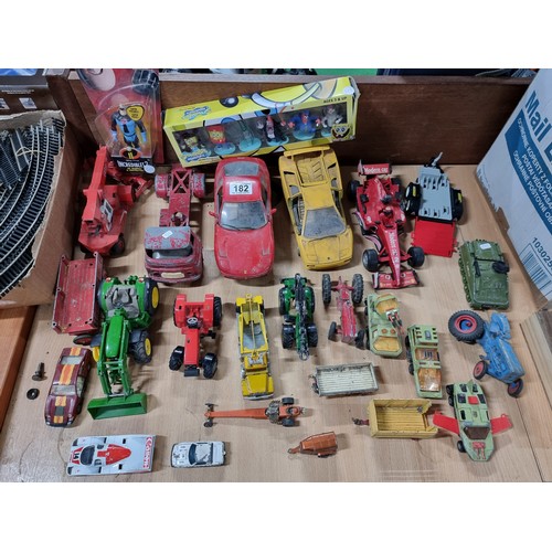 182 - A large collection of various vintage diecast vehicles including 5 tractors, 3 adventure 2000 vehicl... 