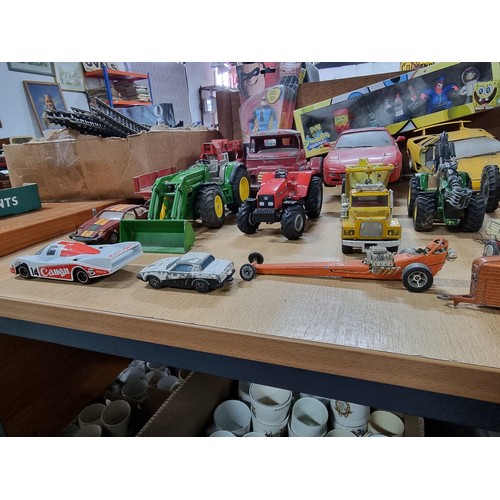 182 - A large collection of various vintage diecast vehicles including 5 tractors, 3 adventure 2000 vehicl... 