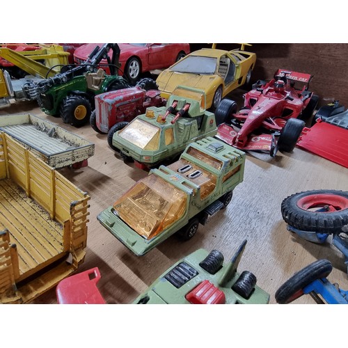 182 - A large collection of various vintage diecast vehicles including 5 tractors, 3 adventure 2000 vehicl... 