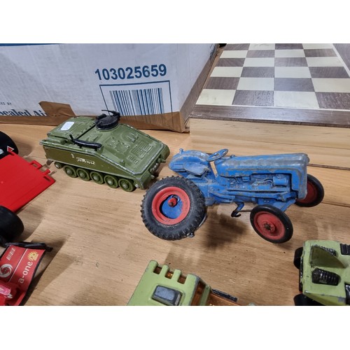 182 - A large collection of various vintage diecast vehicles including 5 tractors, 3 adventure 2000 vehicl... 