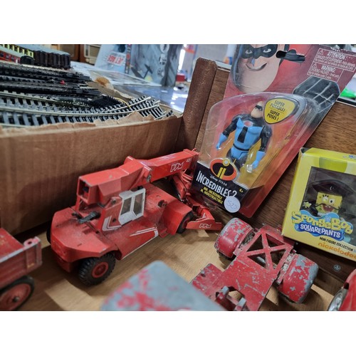 182 - A large collection of various vintage diecast vehicles including 5 tractors, 3 adventure 2000 vehicl... 