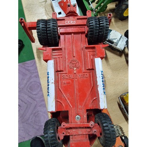 182 - A large collection of various vintage diecast vehicles including 5 tractors, 3 adventure 2000 vehicl... 