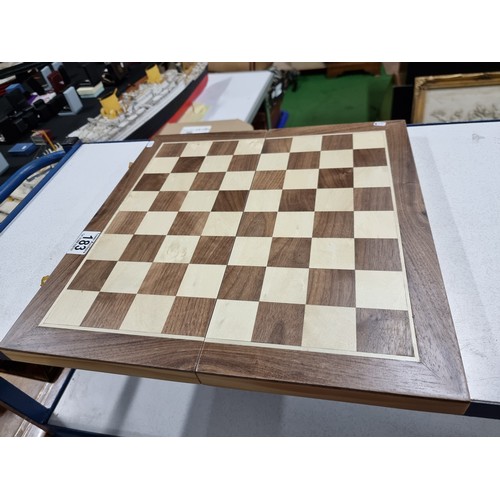 183 - A good quality wooden folding chess board with wooden figures complete in excellent clean condition,... 