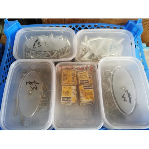 18 - Large quantity of 9 crates containing assorted screws, nails, locking pins, cleats, bolts etc mostly... 