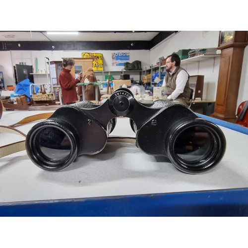 217 - A vintage pair of Carl zeiss jena jenoptem 8x30w binoculars in excellent condition with original lea... 