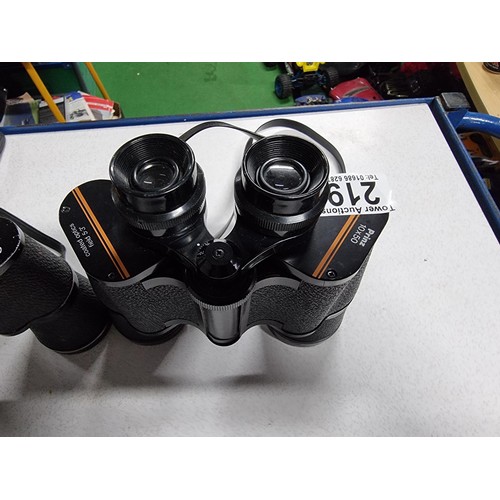 219 - 3 pairs of binoculars including a good quality pair of Carl Zeiss Jena 8x30w binoculars, a pair of P... 