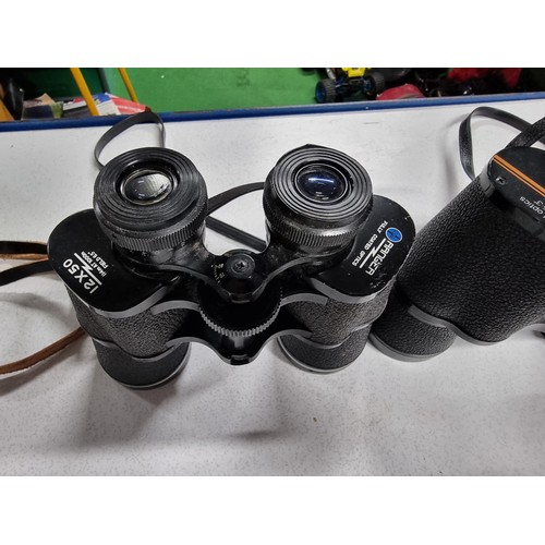 219 - 3 pairs of binoculars including a good quality pair of Carl Zeiss Jena 8x30w binoculars, a pair of P... 