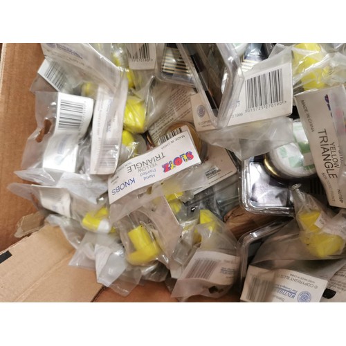 21 - Large quantity of new and sealed ceramic door knobs plastic door knobs, etc all in good order