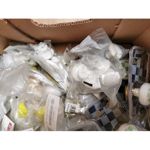 21 - Large quantity of new and sealed ceramic door knobs plastic door knobs, etc all in good order