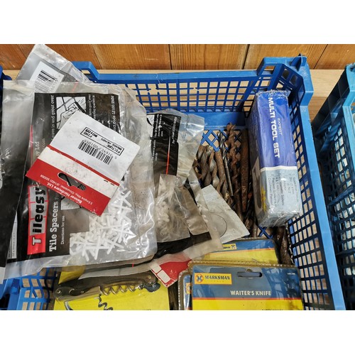 22 - 3x crates containing a large quantity of tile spacers, waiters knives, conical electrical connectors... 