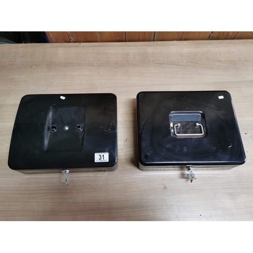 31 - 2x Black metal cashier safes both complete with keys height of 8.5cm, length 30cm depth 24cm