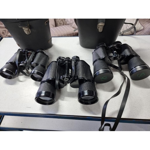 220 - 3 pairs of binoculars, 2 are cased including two 7x50 pairs and one 8X40 by Zenith greenkat and hani... 