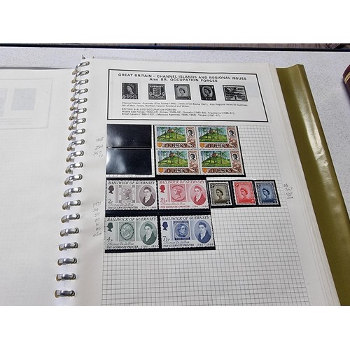 224 - A new world stamp album containing a large quantity of stamps from around the world along with an em... 