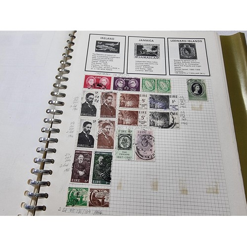 224 - A new world stamp album containing a large quantity of stamps from around the world along with an em... 