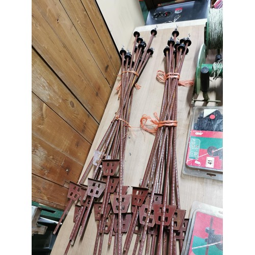 41 - Large quantity of electric fence equipment inc 25 spikes, reel of electric fence wire along with a s... 