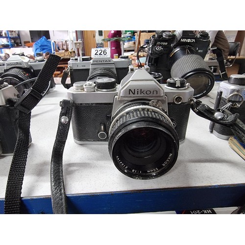 226 - A large collection of good quality vintage 35mm cameras including Voigtlander VSL3/E, a Nikon FM cam... 