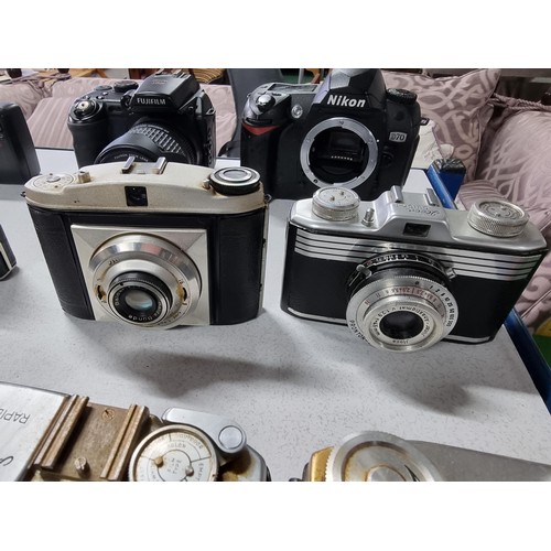 227 - A large collection of 16 x various vintage cameras with various makers which includes 2 modern camer... 