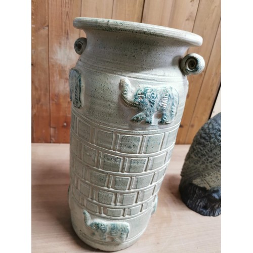 46 - Ceramic tall vase with and elephant design along with a battery operated owl formed bird deterant he... 