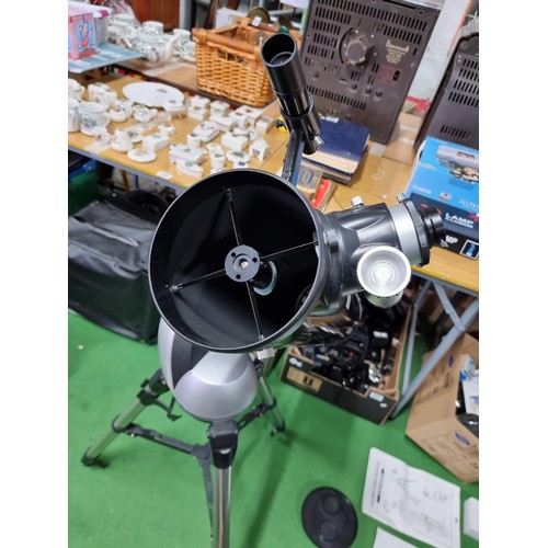 235 - A good skywatcher astronomical telescope along with a quantity of accessories including a remote con... 