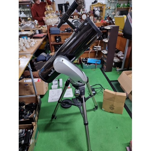 235 - A good skywatcher astronomical telescope along with a quantity of accessories including a remote con... 