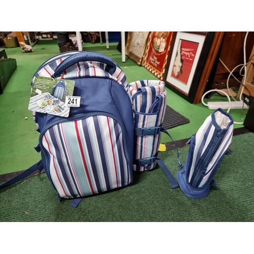 241 - A brand new Eurohike picnic backpack for 4 people complete with contents, bottle cooler and picnic b... 