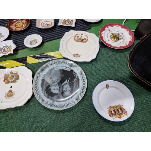 242 - A large quantity of various royal commemorative china including a large collection of royal plates a... 