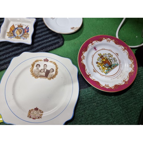 242 - A large quantity of various royal commemorative china including a large collection of royal plates a... 