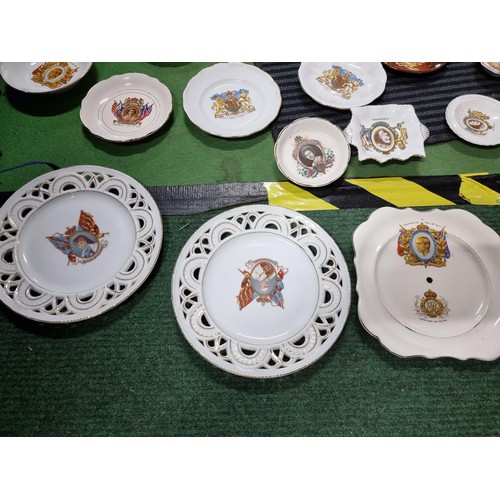 242 - A large quantity of various royal commemorative china including a large collection of royal plates a... 