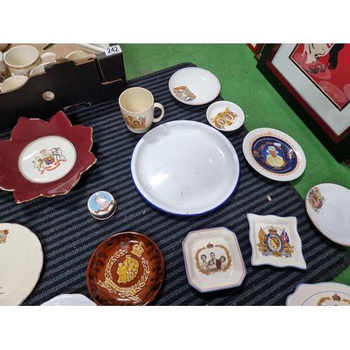 242 - A large quantity of various royal commemorative china including a large collection of royal plates a... 