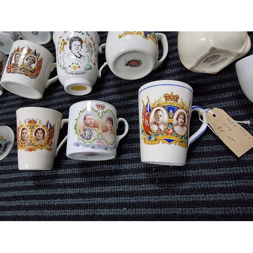 244 - A large collection of Royal vintage commemorative china of mostly mugs including a mug marked for Ne... 