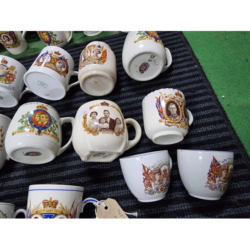 244 - A large collection of Royal vintage commemorative china of mostly mugs including a mug marked for Ne... 