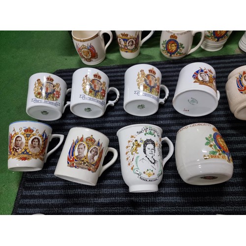 244 - A large collection of Royal vintage commemorative china of mostly mugs including a mug marked for Ne... 