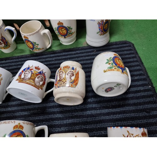 244 - A large collection of Royal vintage commemorative china of mostly mugs including a mug marked for Ne... 