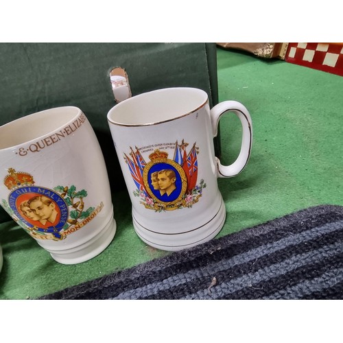 244 - A large collection of Royal vintage commemorative china of mostly mugs including a mug marked for Ne... 