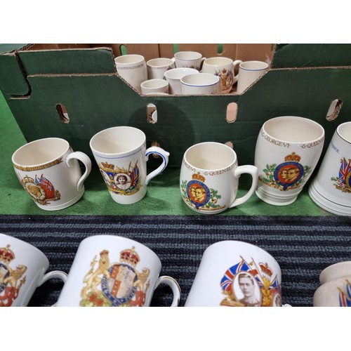 244 - A large collection of Royal vintage commemorative china of mostly mugs including a mug marked for Ne... 