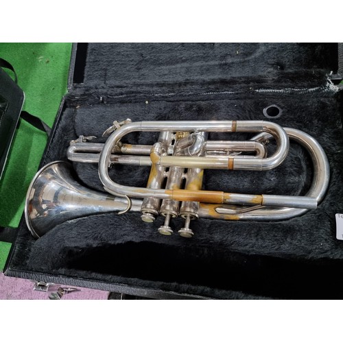 247 - 2 cased cornets, 1 by Bessom the other by blessing XL USA, both missing mouth pieces and are requiri... 