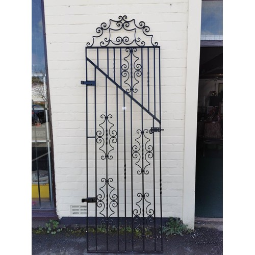 74 - Large ornate iron gate of excellent quality in very good condition with scrolling to the top. Height... 