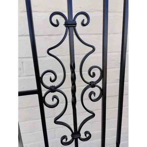 74 - Large ornate iron gate of excellent quality in very good condition with scrolling to the top. Height... 